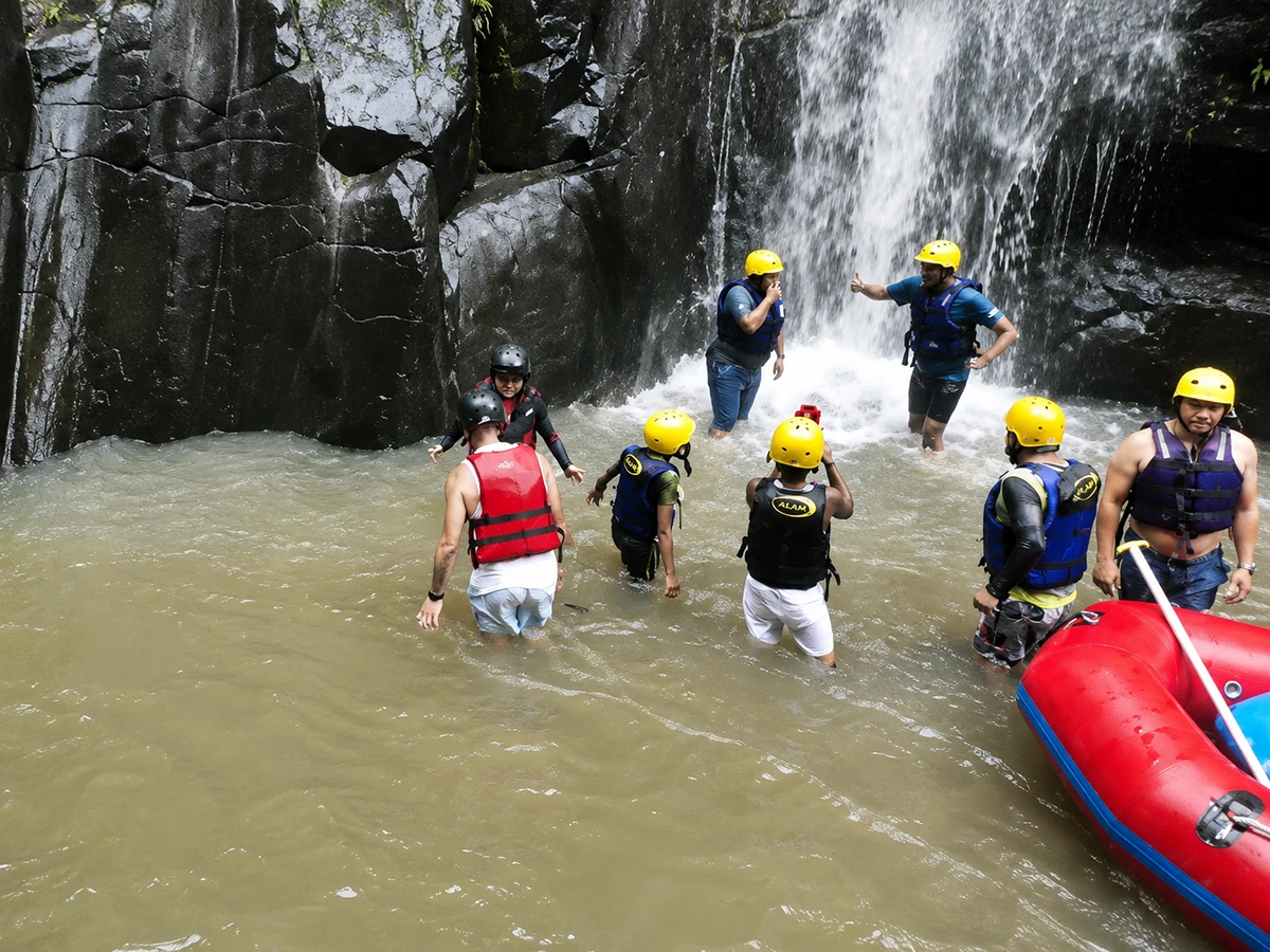 Natural waterfall along Ayung River rafting route in Bali