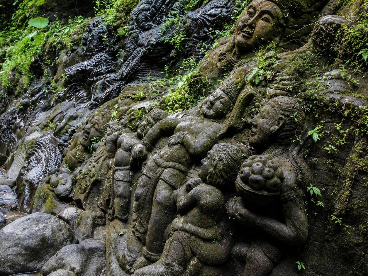 Ancient Ramayana stone relief along Ayung River rafting route in Bal