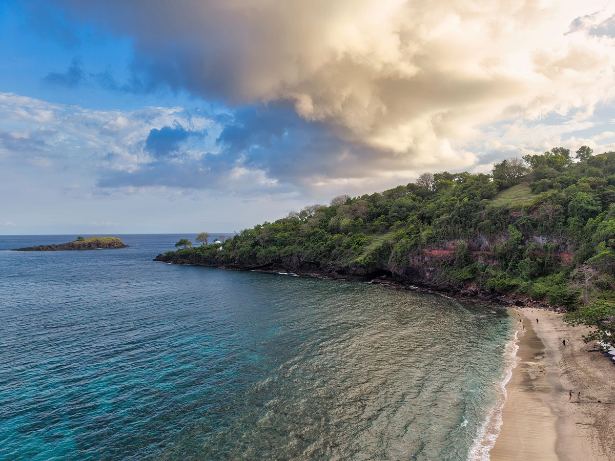 Virgin Beach with white sand and crystal-clear water in East Bali